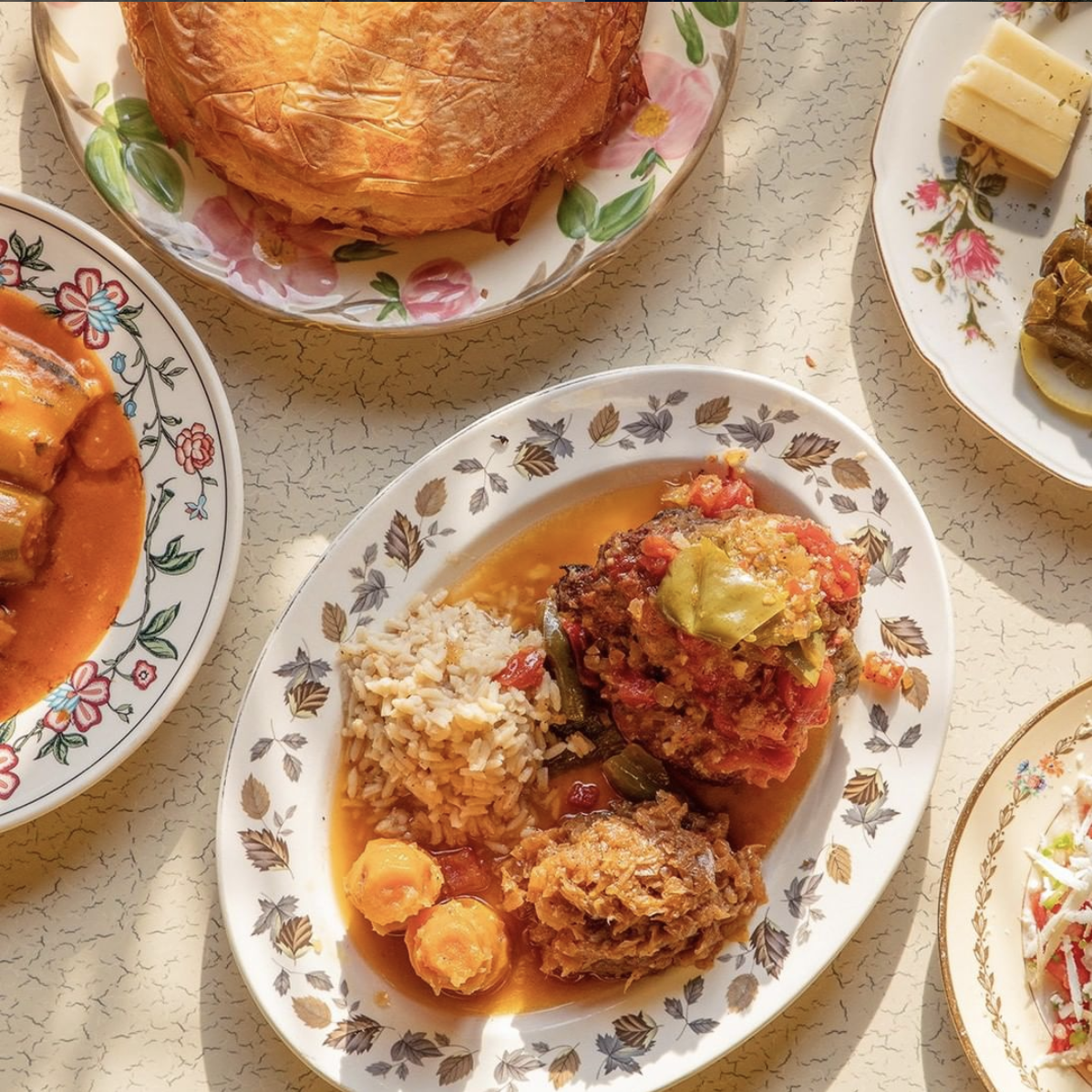 Various Serbian food items on a decorative platter.